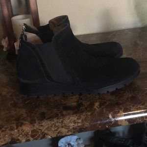 Black booties.